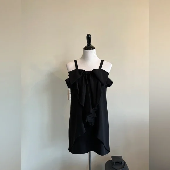 Club monaco black dress with a front bow. Club monaco black dress with a front bow.